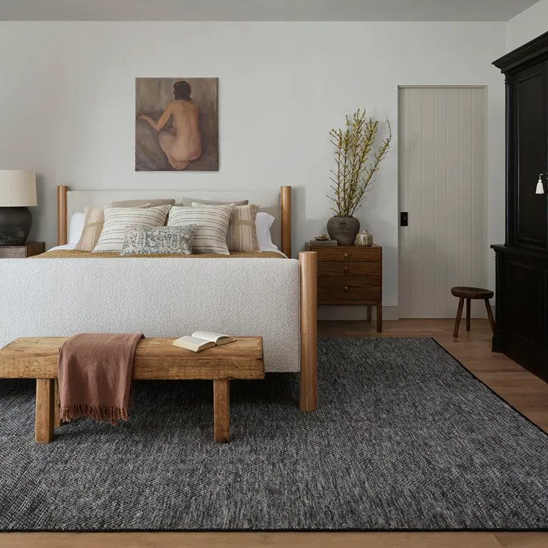 Dark Area Rug in Modern Earthy Bedroom | De/Mar Design Studio