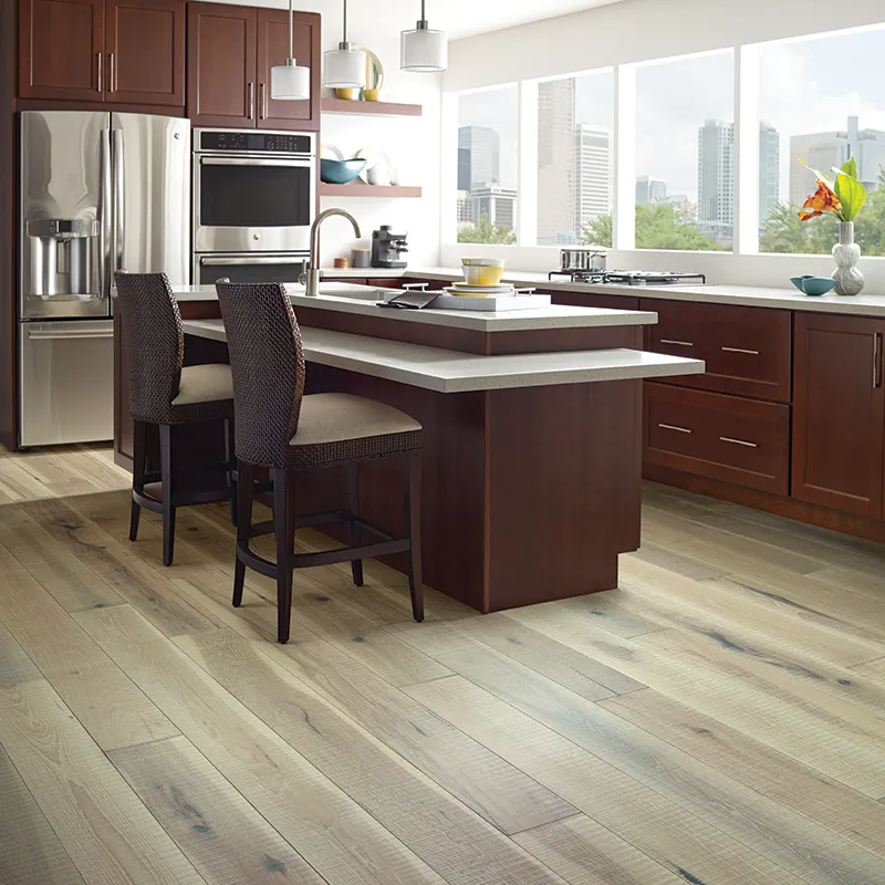 Hardwood flooring in modern kitchen with dark cabinets | De/Mar Design Studio