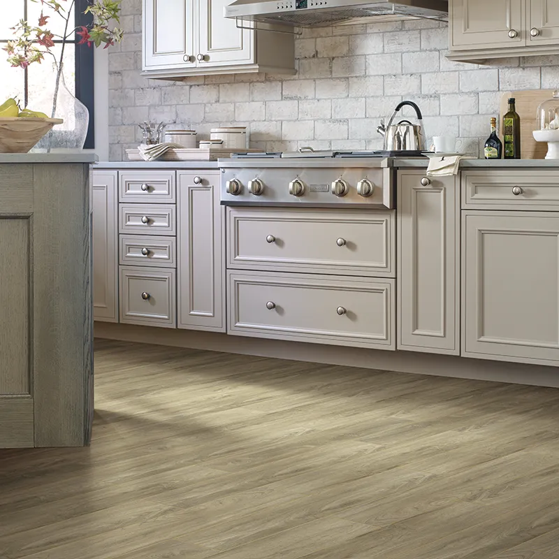 Tan Luxury Vinyl Flooring in White Kitchen | De/Mar Design Studio